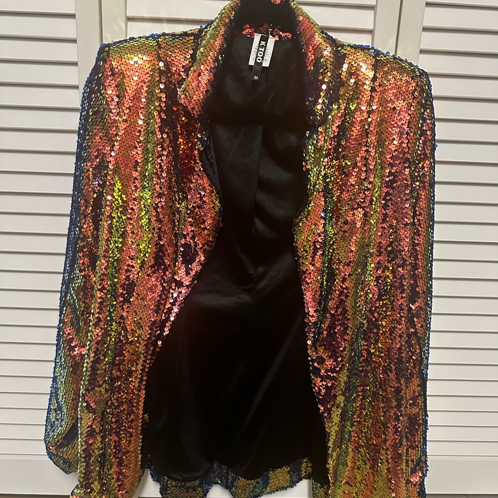 Sequin blazer size MEDIUM. Worn one time. Comes from a smoke and pet free home.